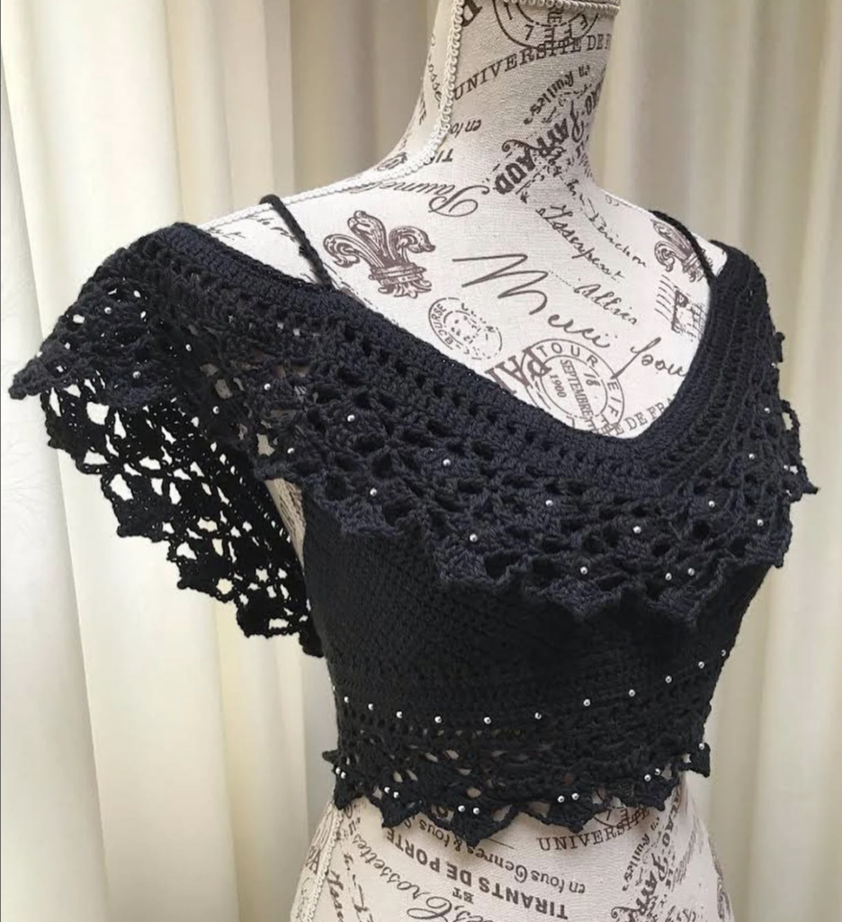 Crochet Pattern Roundup of 10 Crochet Crop Tops for Springtime done by Emily of Crochet Aweigh for Cre8tion Crochet.